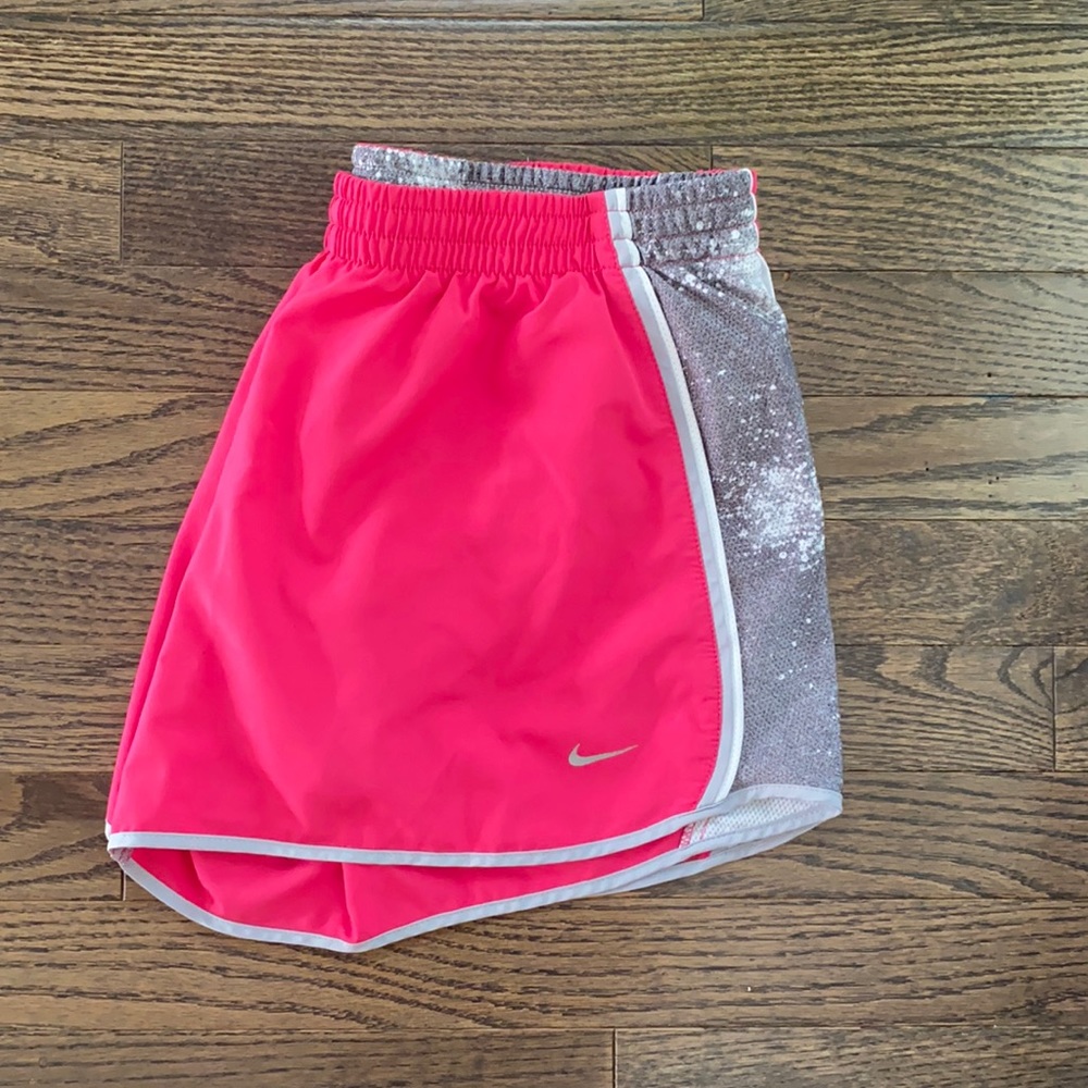 Pink Nike running shorts